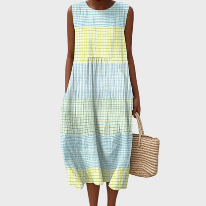 Knee-length sleeveless tiered dress with yellow, green, and blue grid stripes