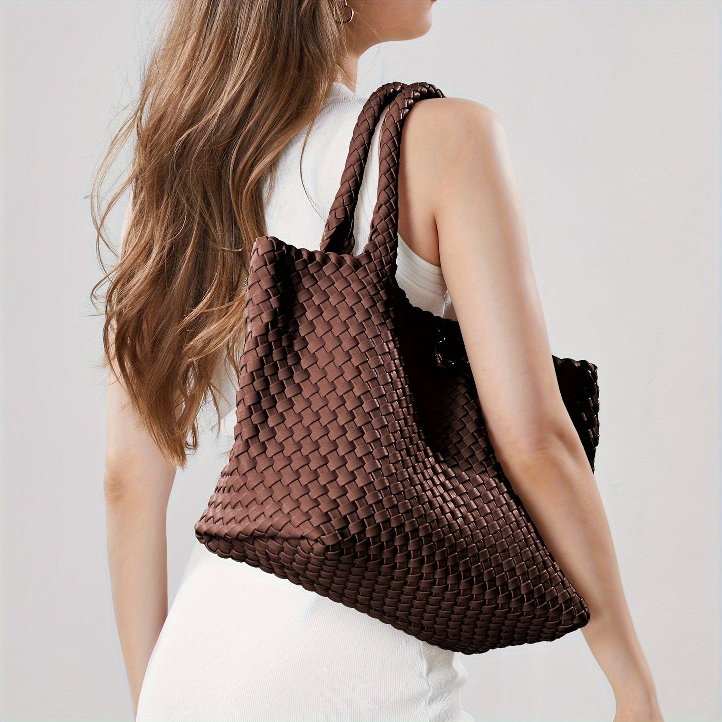 Woven tote bag in rust brown with wide woven handles