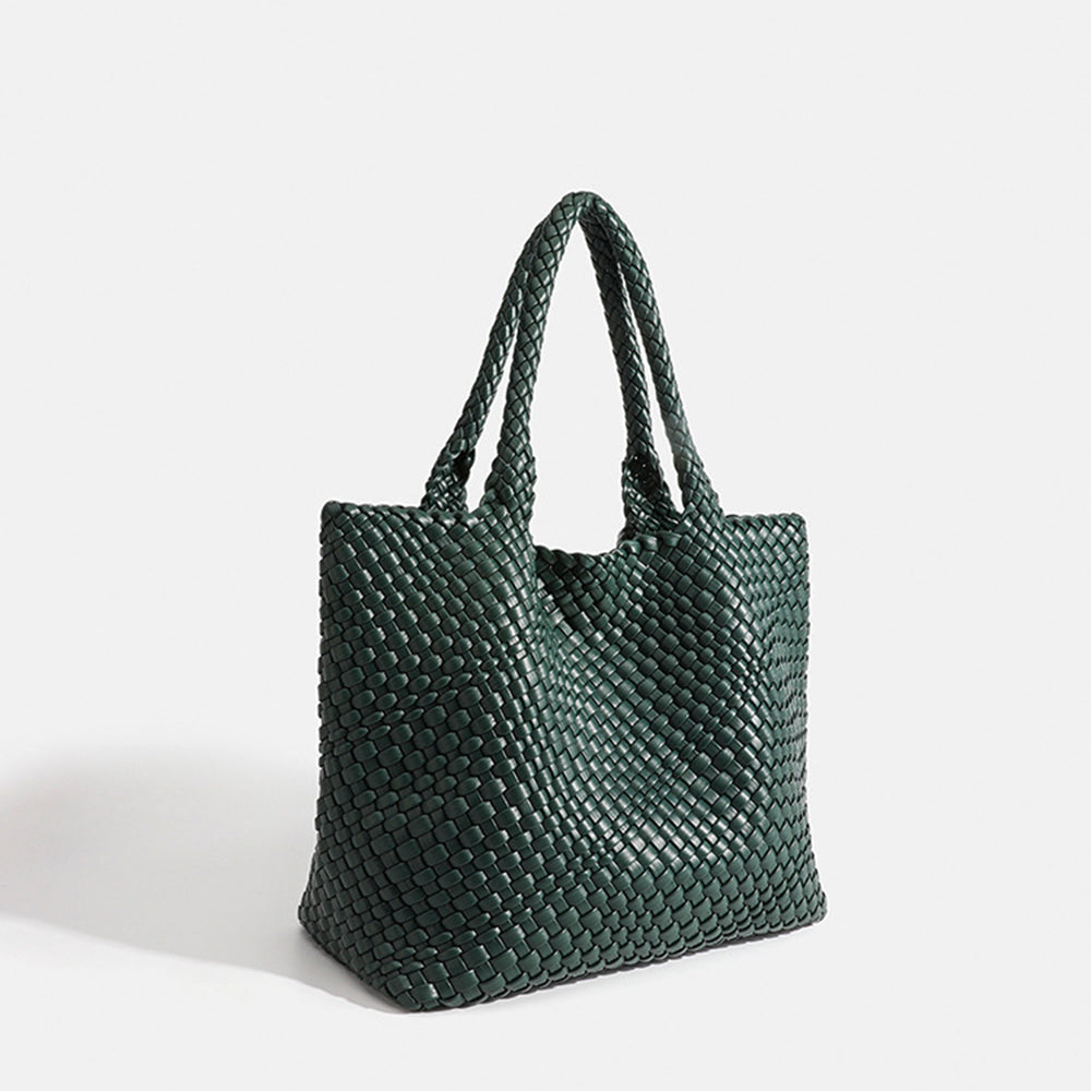 Deep green woven tote bag with top handles and textured basket-weave fabric