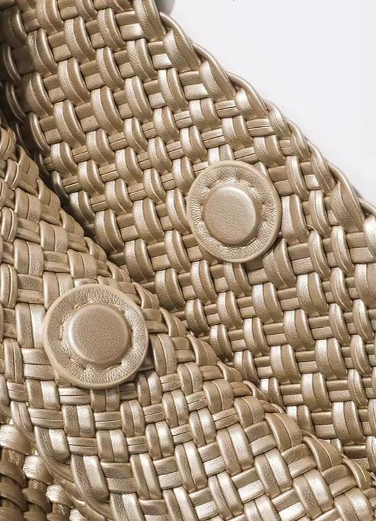 Metallic grey woven tote bag with round textured emblem details