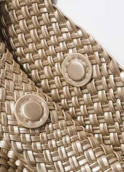 Metallic grey woven tote bag with round textured emblem details